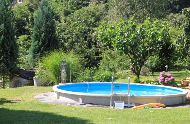 2-room house with private garden and pool in shared use