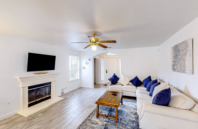2-story home with private outdoor pool, fenced backyard, fireplace, patio, & AC