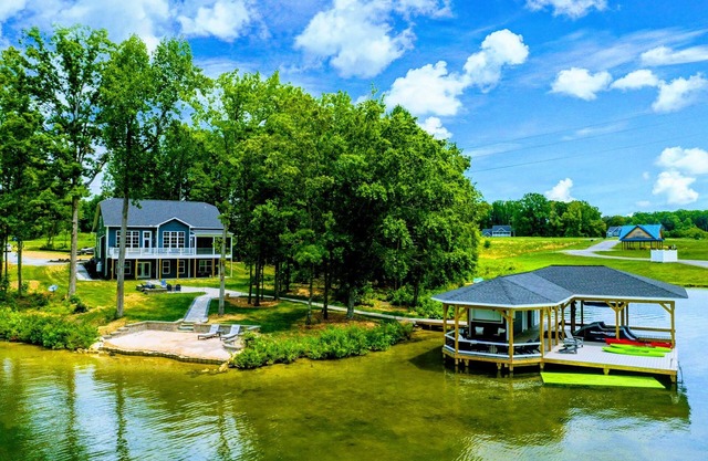 250’ of Lakefront with Boat House & Private Beach