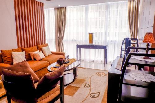 2BR Apartment Cozy Pool View Kemang Village with Access to Mall By Travelio
