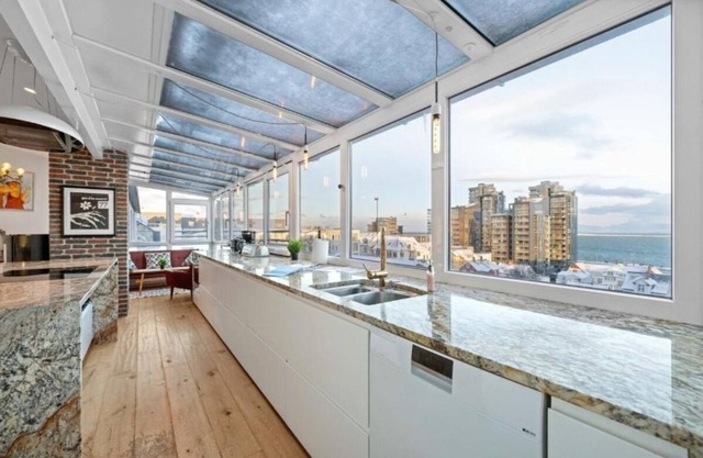 3BR Penthouse with Stunning Mountain, Ocean, & City Views in Reykjavik's