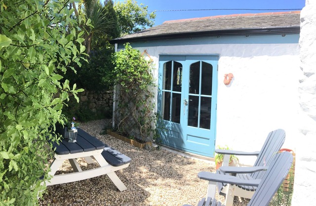 400 year old listed Cornish cottage, tastefully modernised with secluded garden.