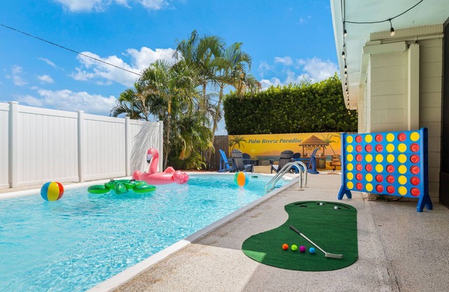 7 Min to Beach ~ Pool, BBQ & Games Getaway