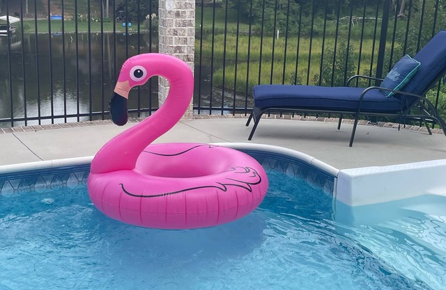 A NEWER UPSCALE LAKEFRONT HOME WITH POOL
