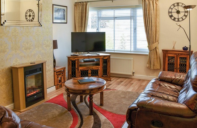 A seaside delight having a sandy beach, shops and pubs all nearby.