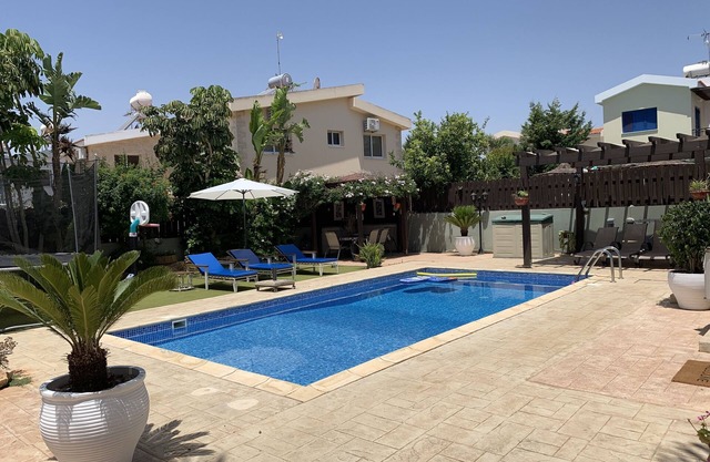 A Stunning beach villa with beautiful gardens, private beach and private pool!