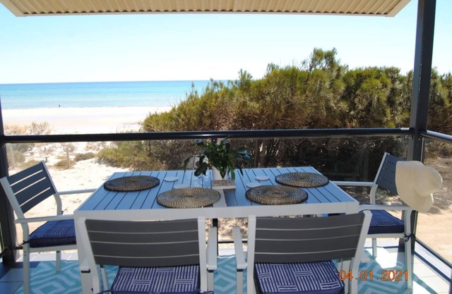 Absolute beachfront 2 bedroom upstairs unit SAndy Feet 🦶 3