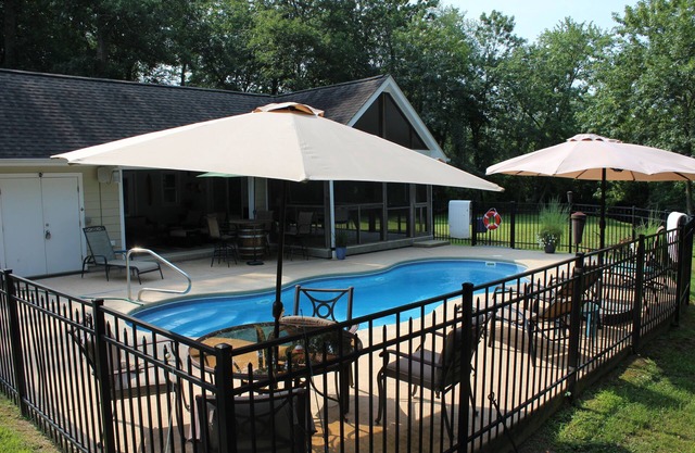 AMAZING Coastal Retreat along Love Creek w/private pool, hot tub and pool house