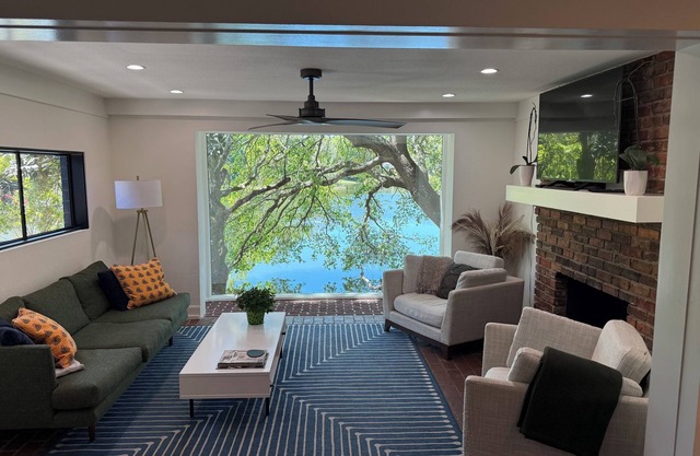 Amazing lakefront mid-modern 3-bed Winter Park home surrounded by Natural Beauty