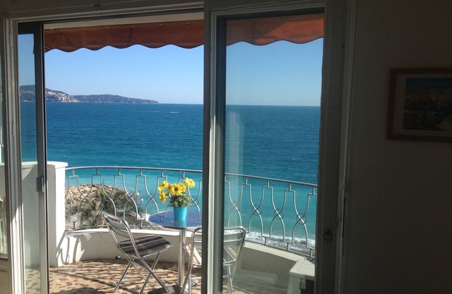 AMAZING VIEW! 30 Seconds to Beach! A/C,WIFI,Phone,TV, Balcony