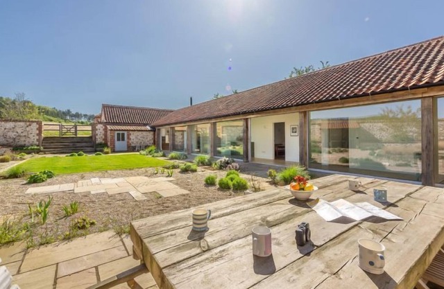 An enchanting luxury self-catering coastal barn, set in an unrivalled position.