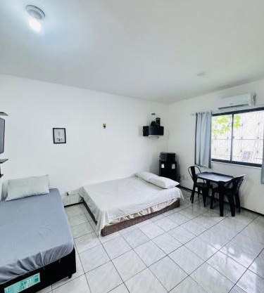 Ap em bairro nobre com garagem e ar
