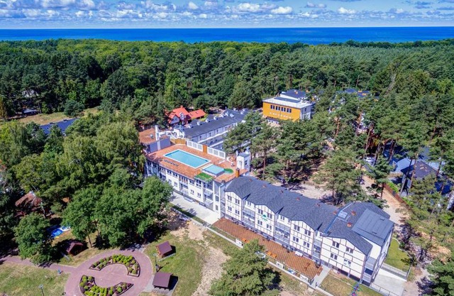 Apartamenty Poddąbek- basen kryty, sauna, animacje dla dzieci , małpi gaj, baseny na dachu
