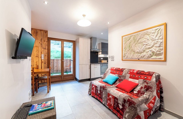 Apartment 'Appartement - Lanslevillard' with Private Terrace and Wi-Fi