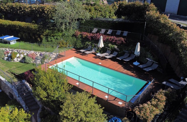 Apartment balcony view, heated swimming pool, air conditioning,parking area