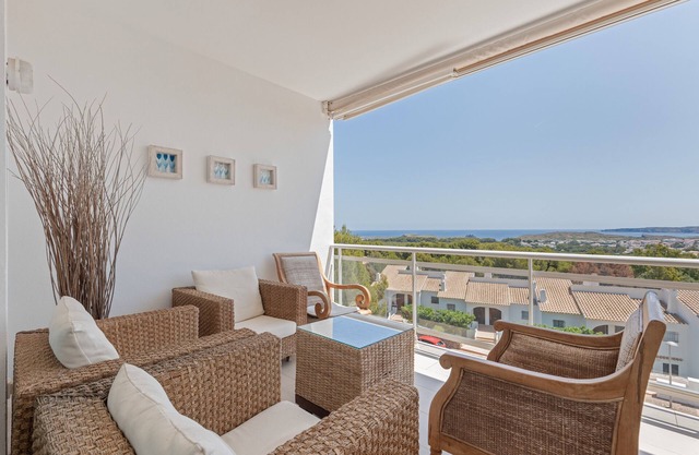 Apartment 'Infinity View Menorca' with Sea View, Shared Pool and Private Terrace