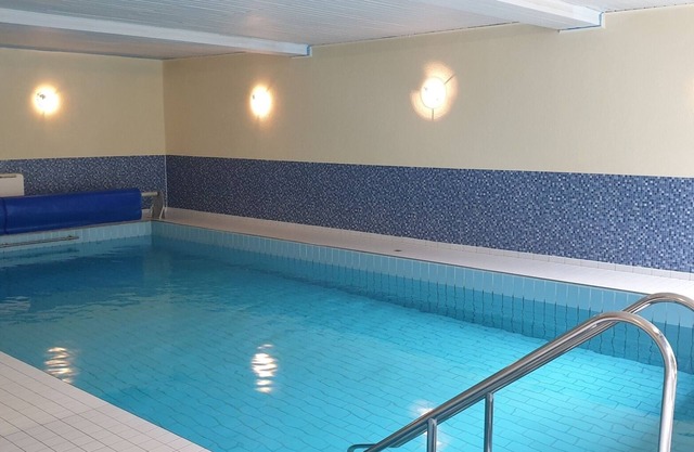 Apartment with indoor pool, garden and parking