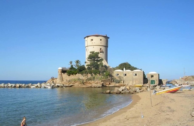 Apartments in ancient tower on the sea