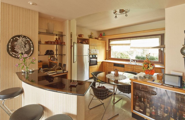 Architect-designed villa in a garden paradise with 13x6 pool and tennis court
