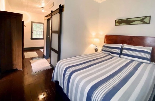 Attached guest cottage/studio one short block from the beach.