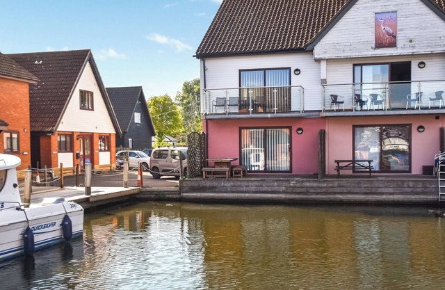 Attractive "upside down" waterside home, with four en-suite bedrooms.