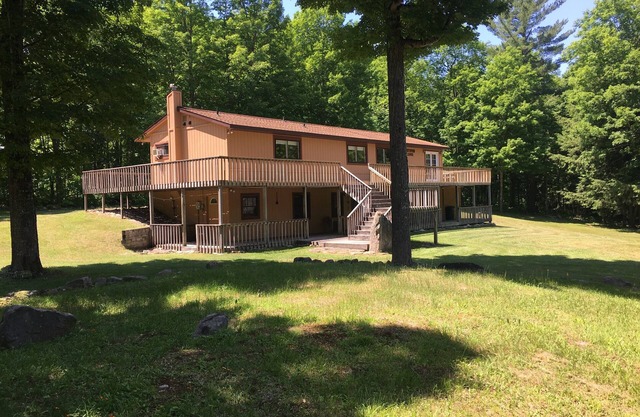 Atv-Snowmobile Trail, sits on the Laughing Whitefish River, sleeps 16 people.
