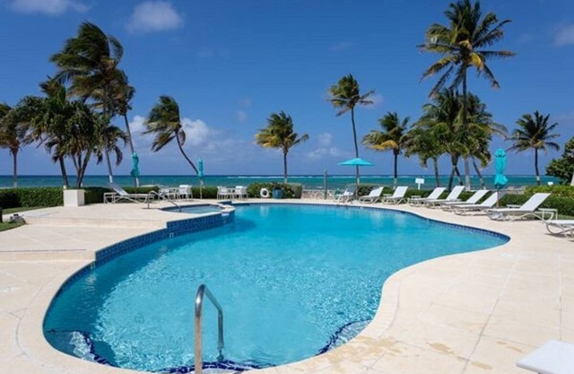 Beach front unit 2 bedroom/2 bath - steps to the beach or pool! Sleeps 5.