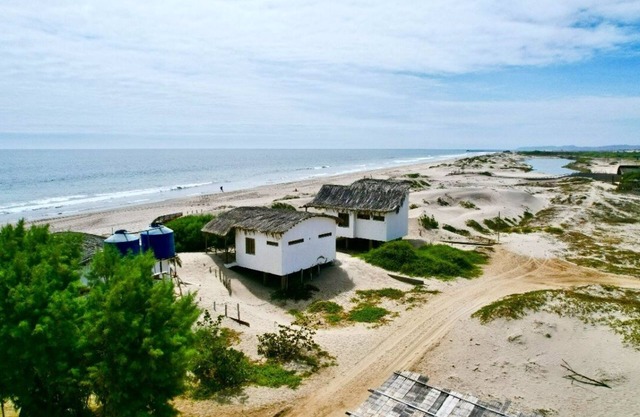 Beach loft hut with private steps onto the beach
