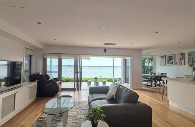 Beachfront Bliss: 4BR Villa Direct Beach Access