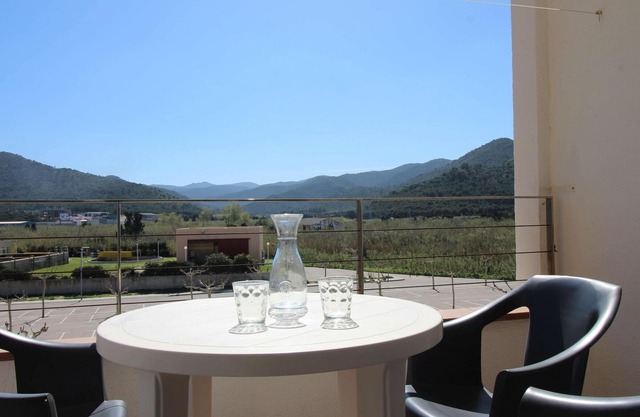 Beachfront Penthouse, 1 Min to La Ribera Beach, Terrace, Parking, WiFi, Sleeps 4