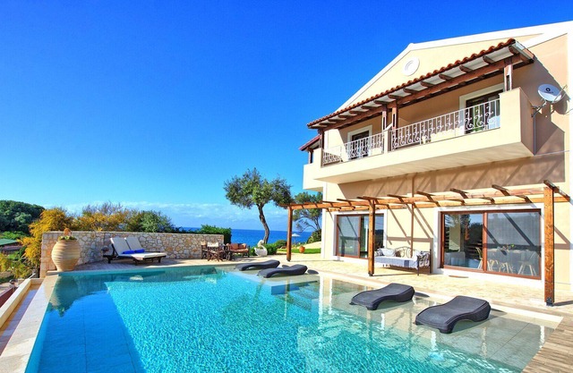 Beachfront Villa SeaWave - Seaside Villa Rental in San Spyridon, Corfu Island, Greece