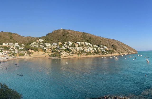 Beachfront villa with views of El Portet Bay