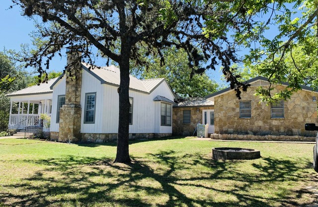 Beautiful historic 1911 farm-style house located within the Blanco State Park