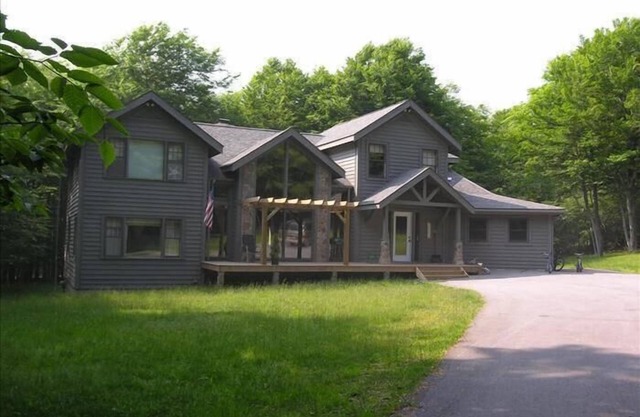Beautiful home offers a large yard, generous deck and convenient location.
