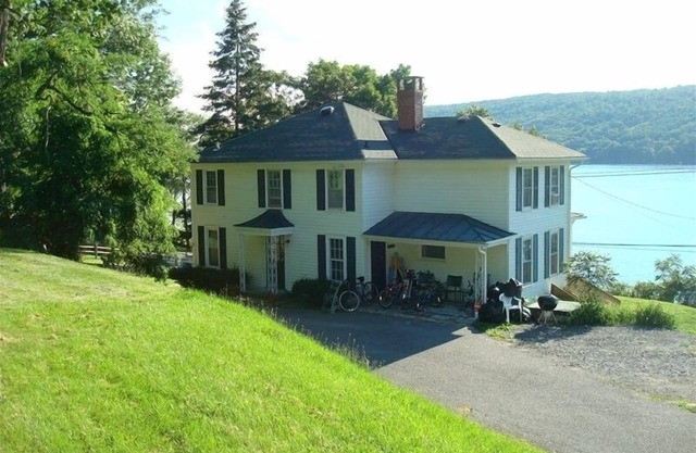 Beautiful House and Yard, Stunning View, 120' Lakefront, Covered Front Porch