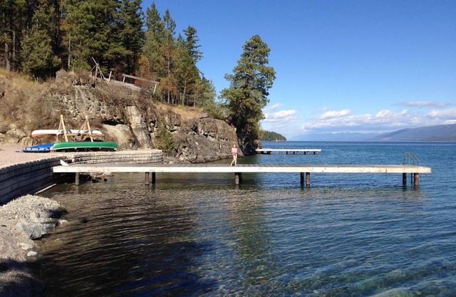 Beautiful timber frame Finley Point home, lake frontage. High speed internet.