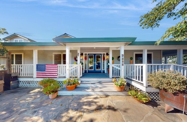 Beautifully renovated working ranch with pool, game tables, fireplaces, & AC