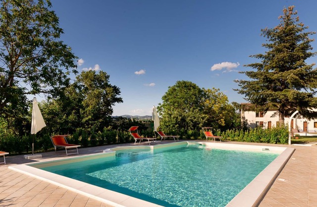 Belvilla by OYO Snug apartment with shared pool