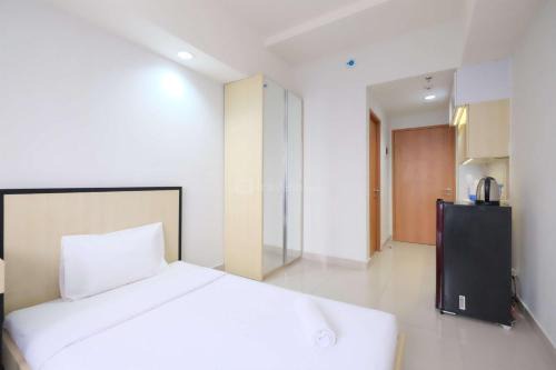 Best Deal and Homey Studio Evenciio Margonda Apartment By Travelio