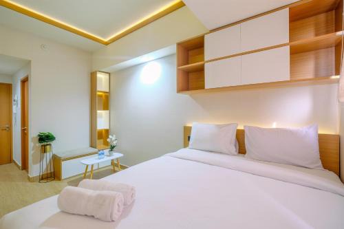Best Deal and Tidy Studio at Evenciio Margonda Apartment By Travelio