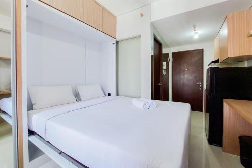 Best Price and Homey Studio Transpark Bintaro Apartment By Travelio