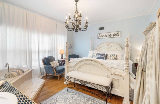 Blue Jay suite with king size bed, soaking tub, smart tv, game room and more!