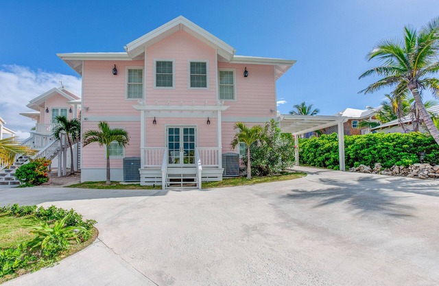 Breezy Palms: A Coastal Sanctuary with Unrivaled Elegance, Pool Dock Ocean