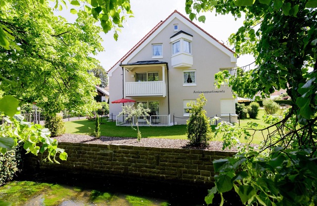 Bright, quiet and modern apartments with a large garden right in the center