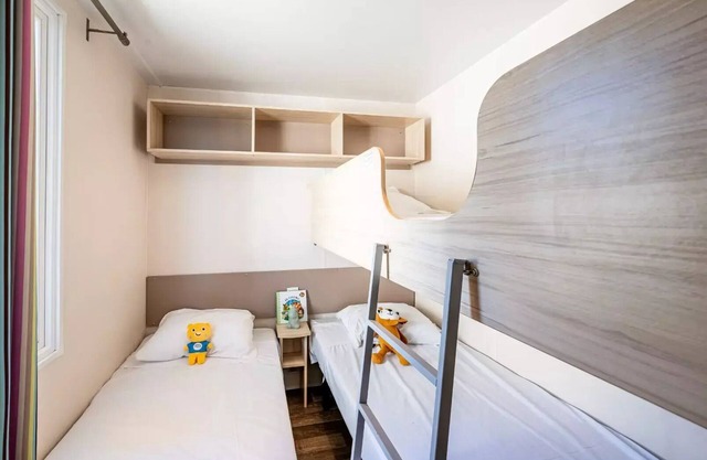 Camping Les Bö-Bains * * - 2 bedroom mobile home on the banks of the river and air-conditioned Sunday/Sunday (29 m²) n°0 to 2 6 people