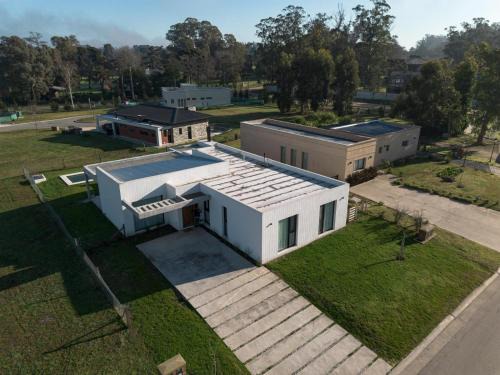 Casa Pedro - Casa en Barrio Privado Arenas Chico Para 6 PAX Con Pileta y Parrilla
