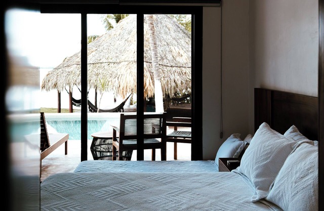 Casa Xchel in front of the bay, pool, jacuzzi and deck.