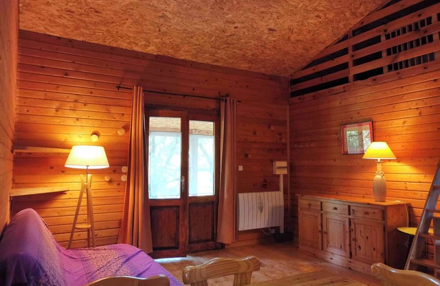 chalet in the nature with swimming-pool and playground