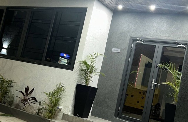 Charming 1-bedroom hotel with WiFi and AC in vibrant Kingston