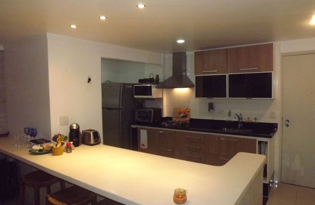 CHARMING, COMFORTABLE, COMPLETE AND WITH A COVERED GARAGE.